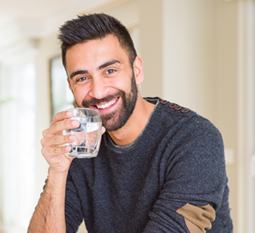 man drinking water