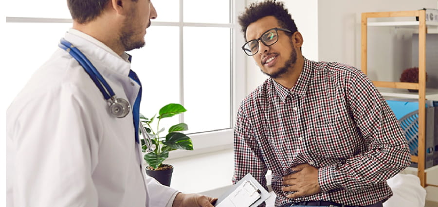 Kidney stone patient consulting with doctor